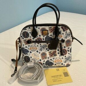 Dooney and Burke Disney Vacation Club purse.
